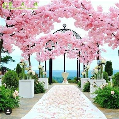 偽の花の木キャノピーピンクの結婚式のアーチ